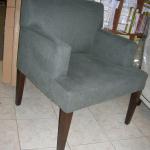 Custom made arm chair with walnut legs.  Featured in Traditional Home and Seattle Home and Garden.